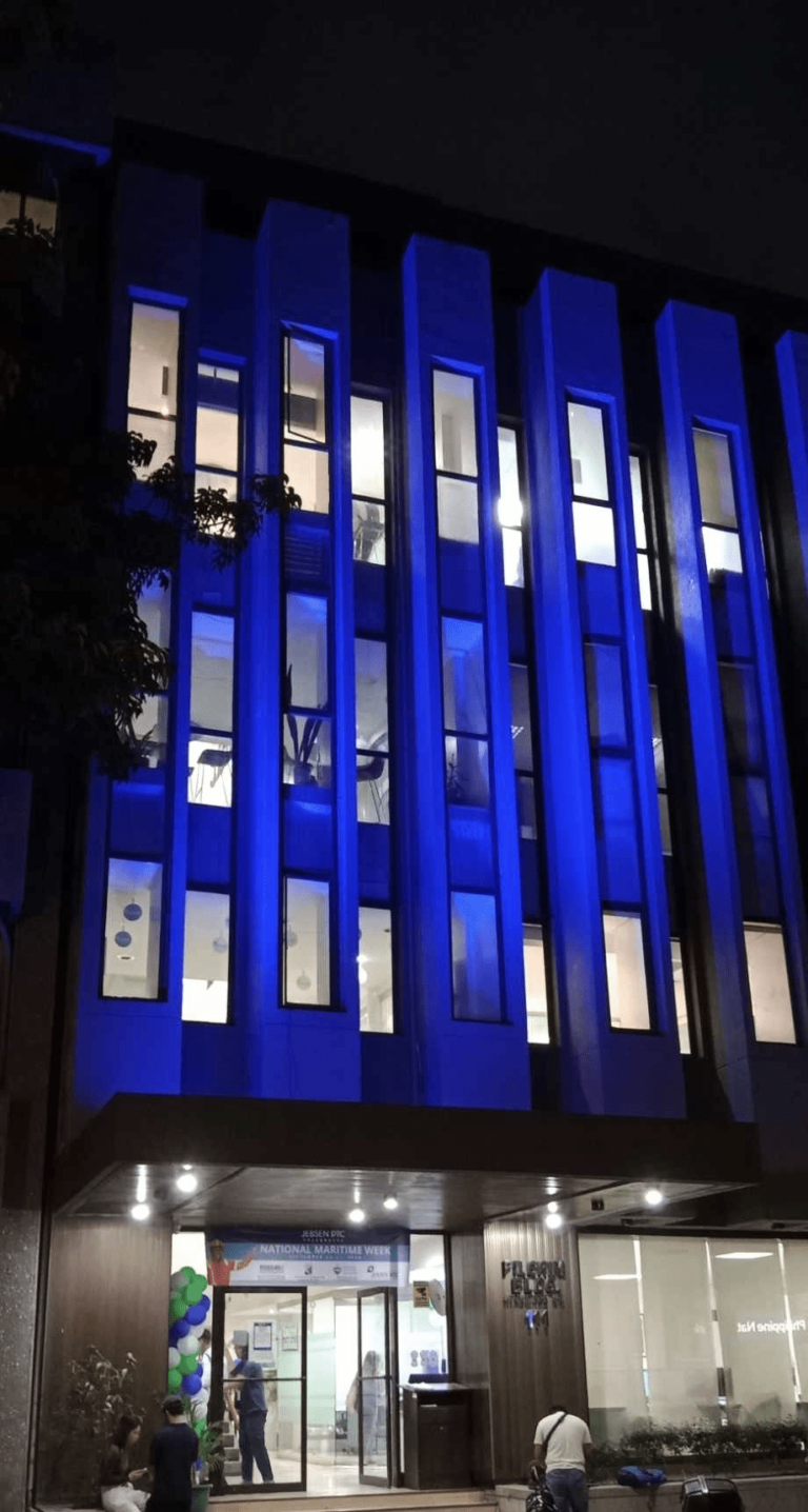 Pilgrim Building Illuminated with Blue Lights