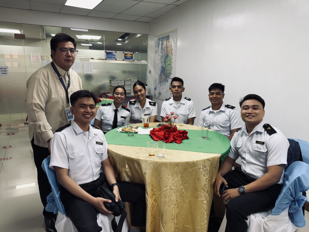 JPMI cadets E/C Mangui, John Kenneth, E/C Andino, Leonel Karl, D/C Acuña, Michelle, E/C Pagalawan, Cylslejoi Andrae, D/C Quiambao, Jayson, and E/C Benis, Nathaniel with Director Ogie San Diego III, Sea-Based Accreditation Bureau (SAB) of the DMW